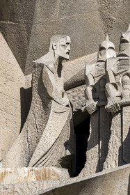 Spain, Catalonia, Barcelona, Eixample district, Sagrada Familia basilica by Catalan modernist architect Antoni Gaudi, listed as a UNESCO World Heritage Site, Gaudi (left) embodied in the figure of an evangelist by the sculptor Subirachs