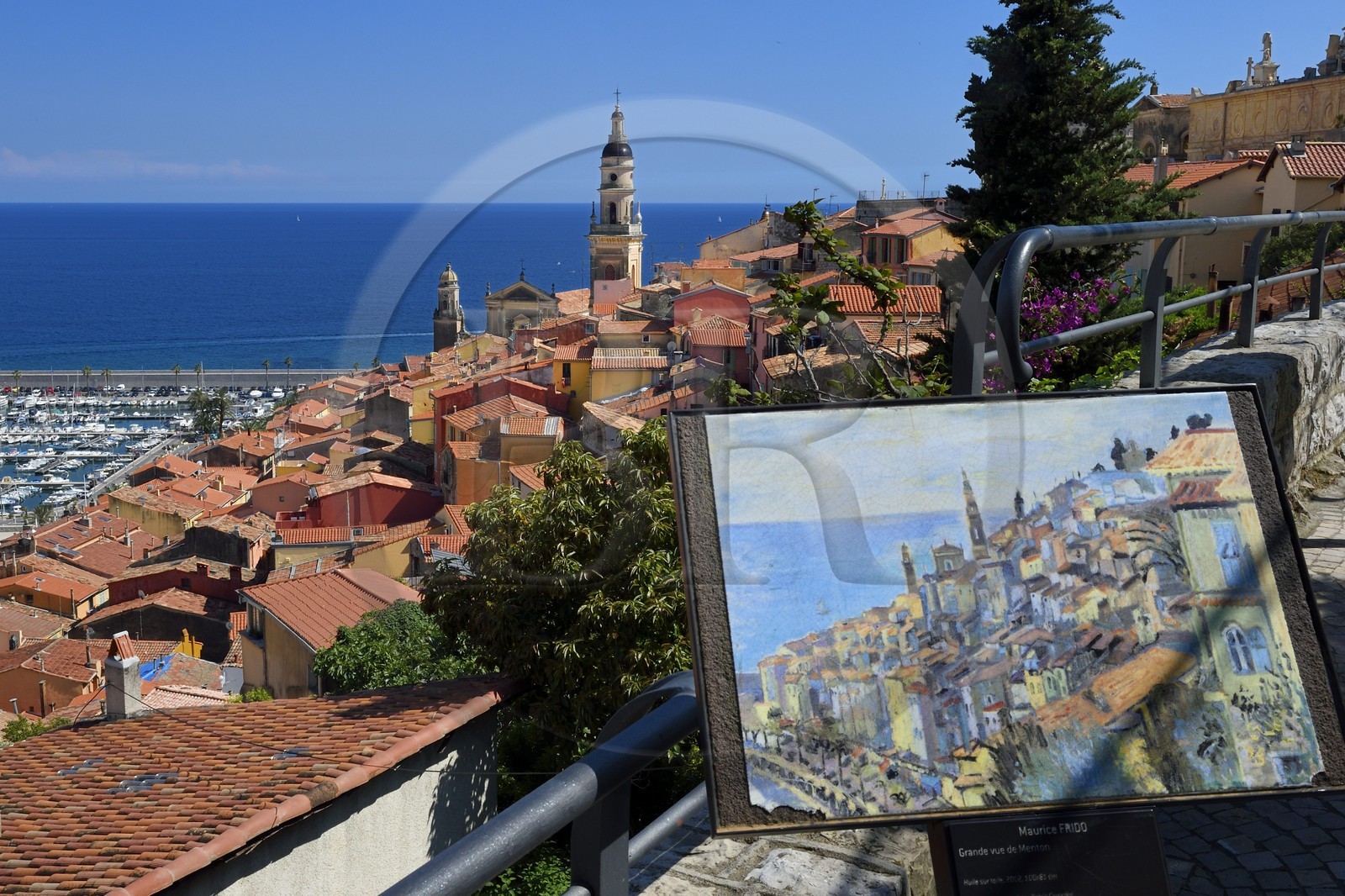 France, Alpes-Maritimes, Menton, old town dominated by the St Michel Basilica and reproduction of a painting of Maurice Frido