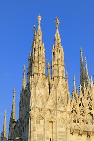 Italy, Lombardy, Milan, the Duomo in the historical center, cathedral in Gothic Flamboyant style, spires topped by statues