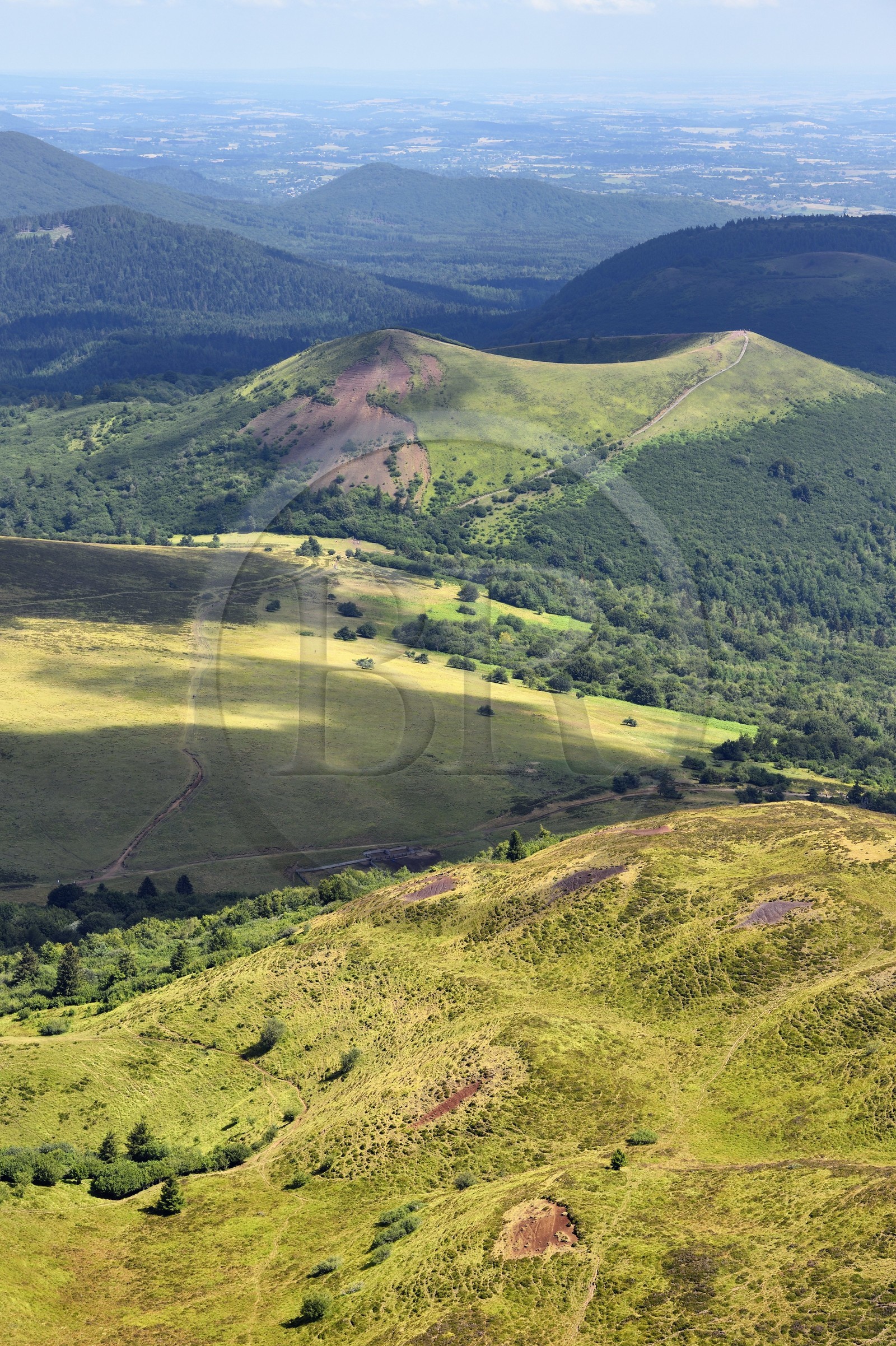 France, Puy de Dome, Parc Naturel Régional des Volcans d'Auvergne (regional nature park of Auvergne volcanoes), Chaine des Puys listed as World heritage by UNESCO, the Traversin and the path leading to the Puy Pariou crater