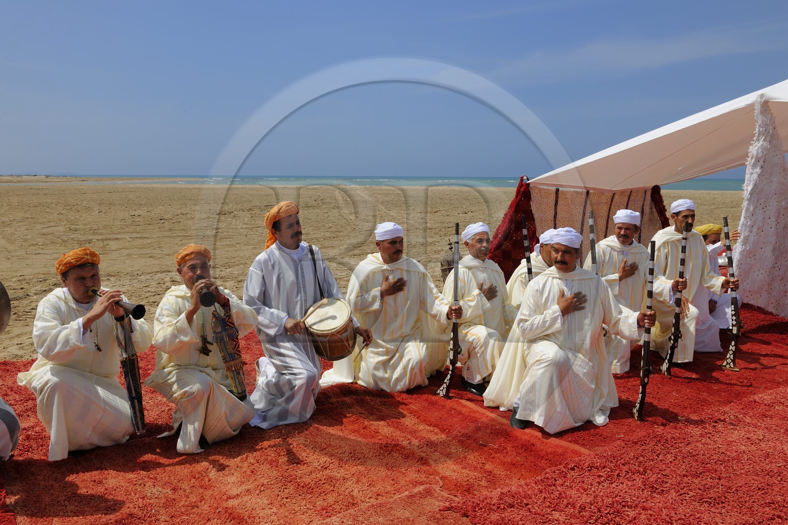 Morocco, Oriental Region, La Reggada traditional dance and music on the beach