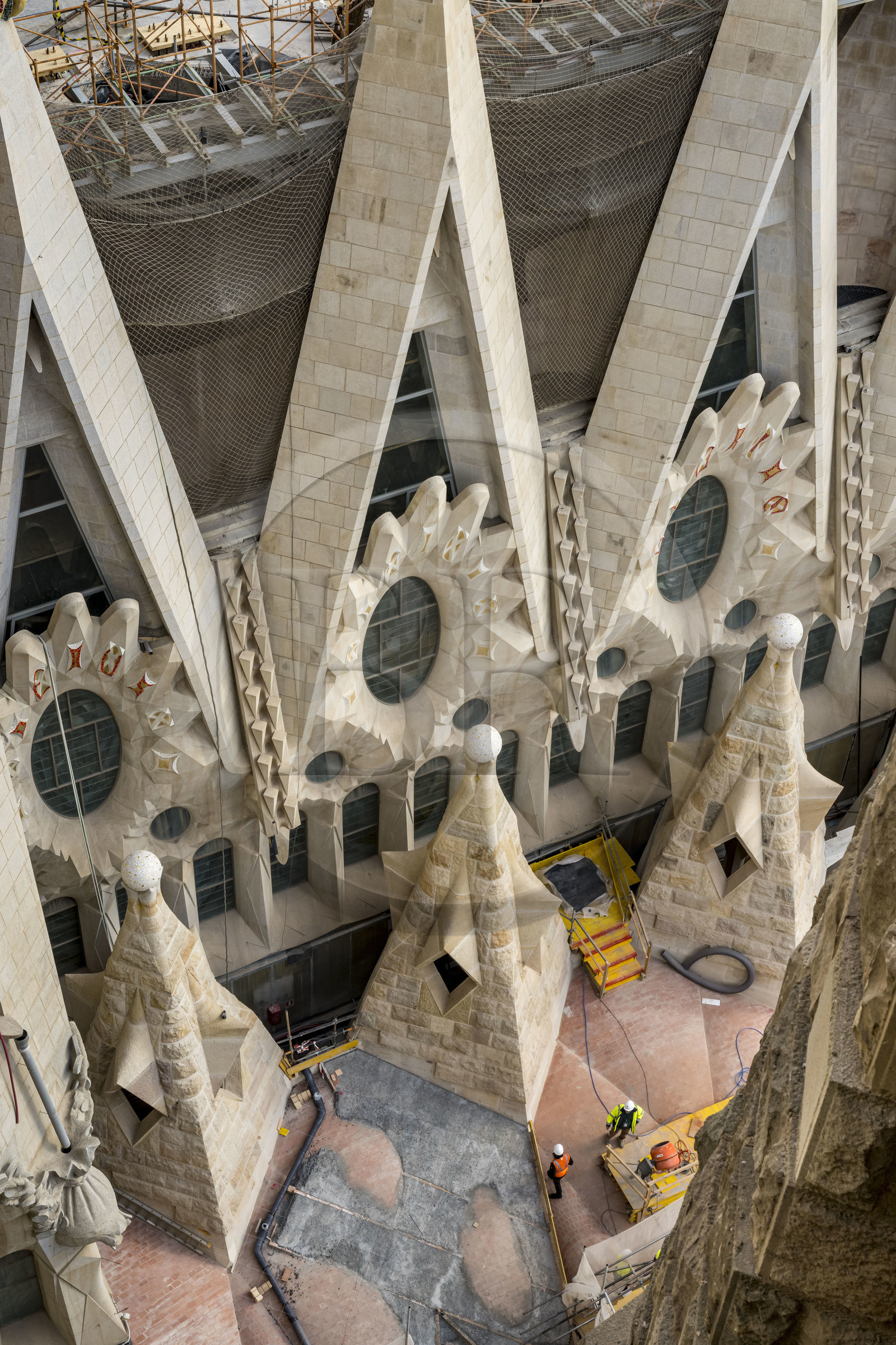 Spain, Catalonia, Barcelona, Eixample district, Sagrada Familia basilica by Catalan modernist architect Antoni Gaudi, listed as a UNESCO World Heritage Site, construction site on the west side of the Nave