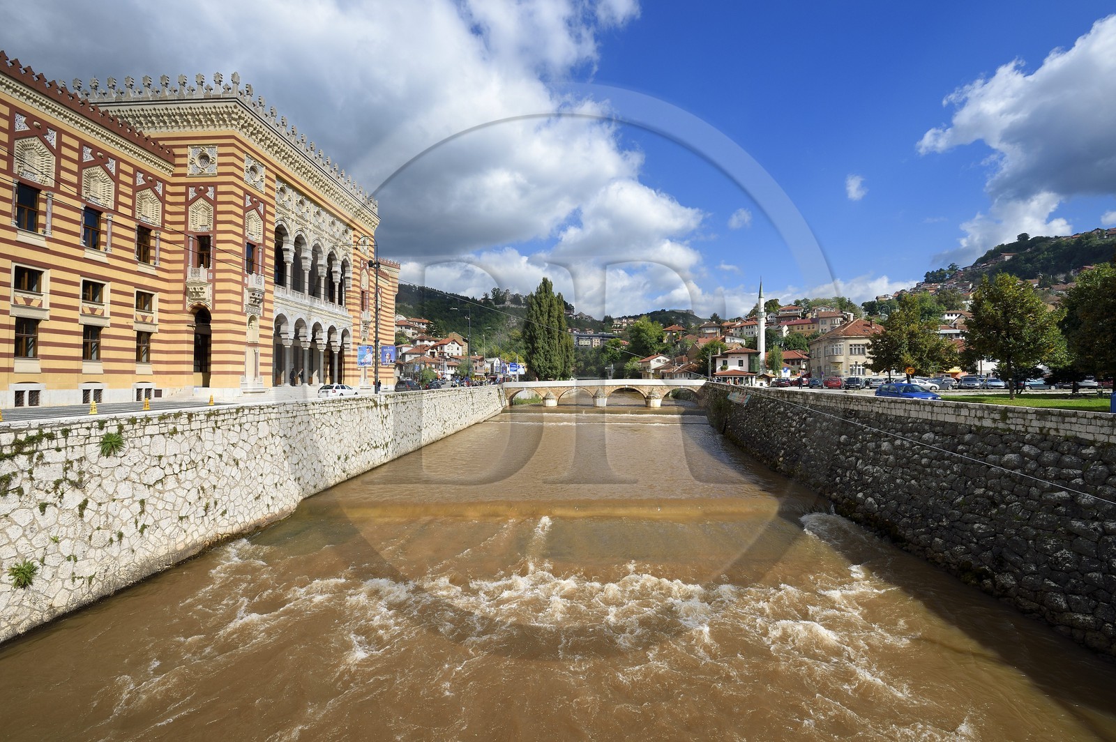 Bosnia and Herzegovina, Sarajevo, the National and University Library and the Seher Cehaja bridge over the Miljacka River