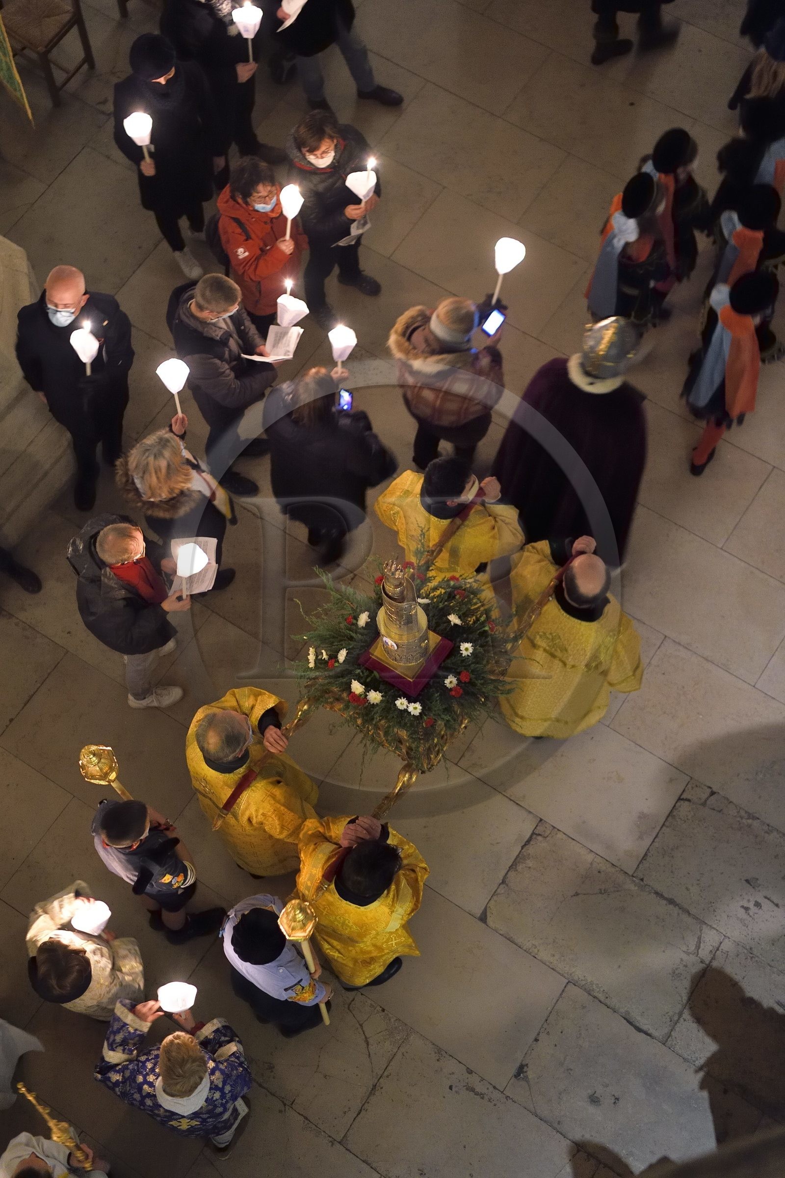 France, Meurthe-et-Moselle, Saint Nicolas de Port, Basilica of Saint Nicolas, torchlight procession which has been celebrated since 1245 on the occasion of Saint Nicholas, the relic of Saint Nicolas blessing dexter (according to tradition it is the bones of a joint of the right hand of the bishop) that is kept in a reliquary arm of the late 19th century in silver, gold, enamel and diamonds