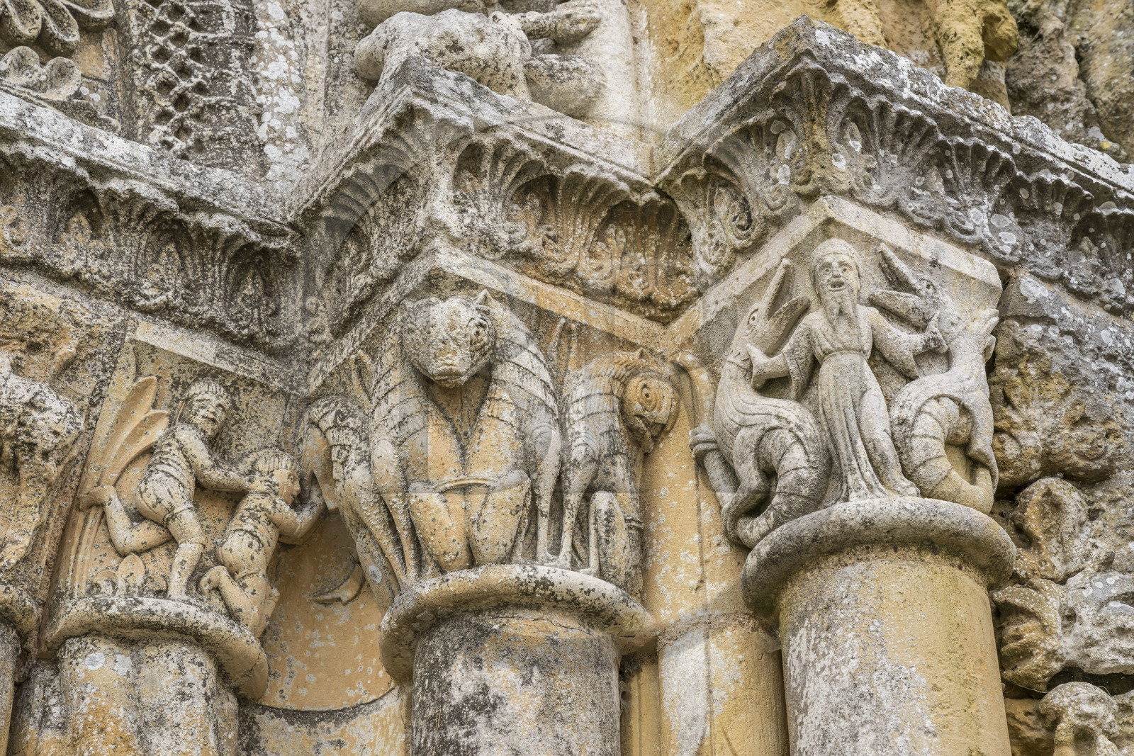 France, Vendee, Vouvant, labeled The Most Beautiful Villages of France, the Notre-Dame-de-l'Assomption church, capitals of the lower Romanesque part of the 12th century on the monumental portal