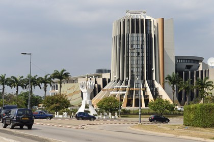 Gabon, Libreville, boulevard Triomphal El Hadj Omar Bongo, the Flame of Peace sculpture in front the Ministry of Petroleum