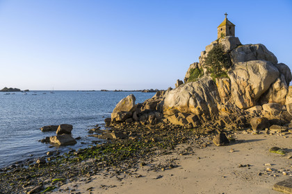 France, Cotes-d'Armor, Cote d'Ajoncs, Penvénan, Port Blanc on the GR 34 long-distance trail, the Rocher de la Sentinelle (Sentinel Rock) surmounted by an oratory