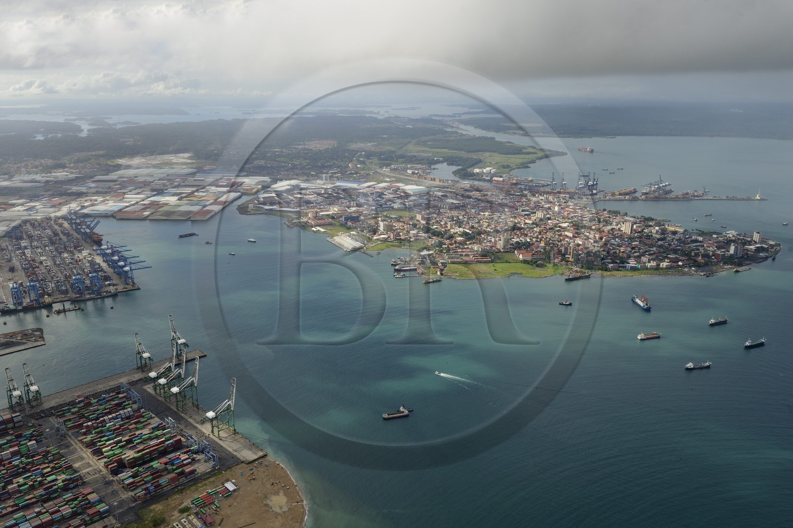 Panama, Colon province, the city of Colon in the Limon Bay (Bahia Limon) at the output of the Panama Canal on the Atlantic side in the background right, the vast warehouses locate the Colon Free Trade Zone (aerial view)