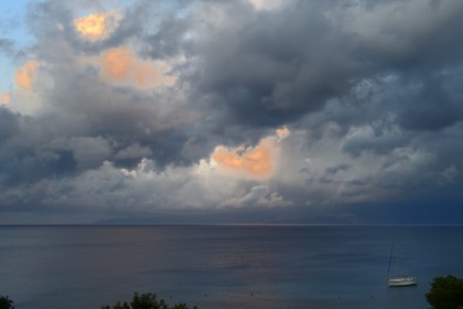 Greece, Crete, Agios Nikolaos region, Elounda, stormy sky at sunset